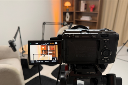 FX30 on a tripod with a viewfinder displaying a podcast set up